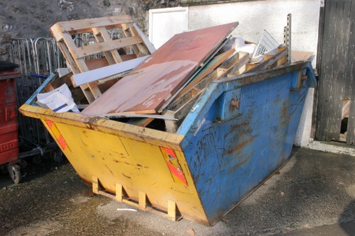 A professional team clearing furniture in a Wood Green home